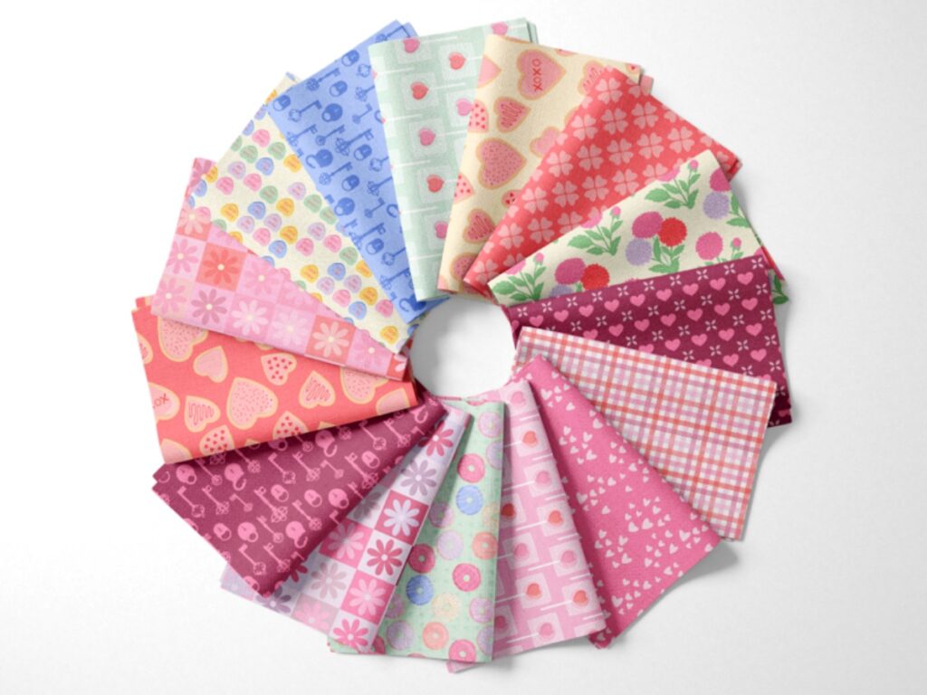 Colorful Valentine's Day Fabric Collection fanned out in a circle.